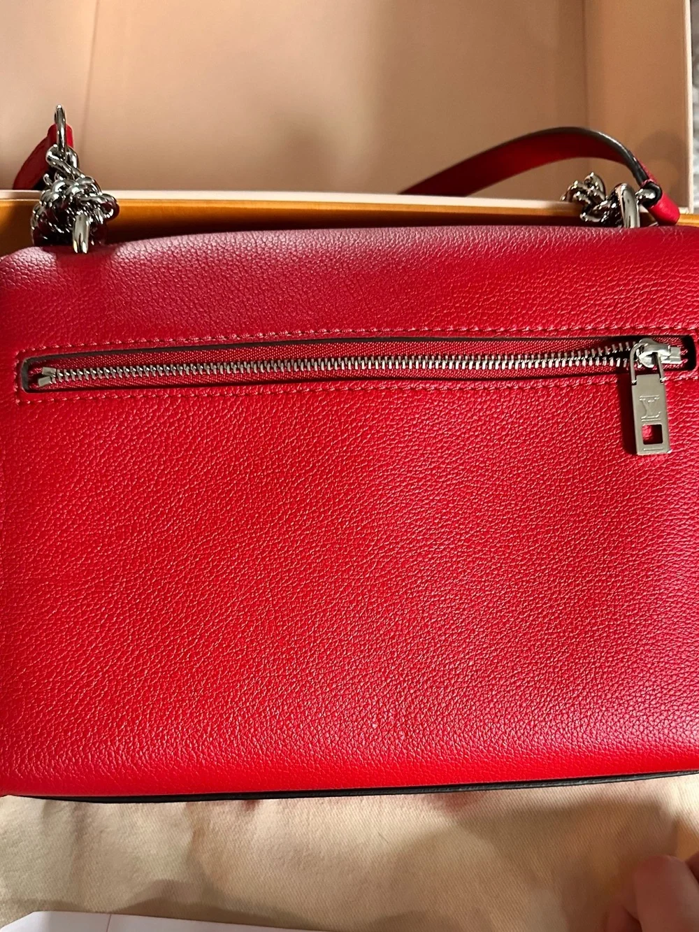 Louis Vuitton Mylockme BB in color RUBY